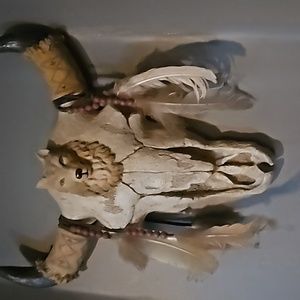 Hanging indian with little wolf